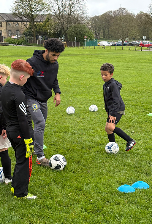 Players taking part in an S&S football camp